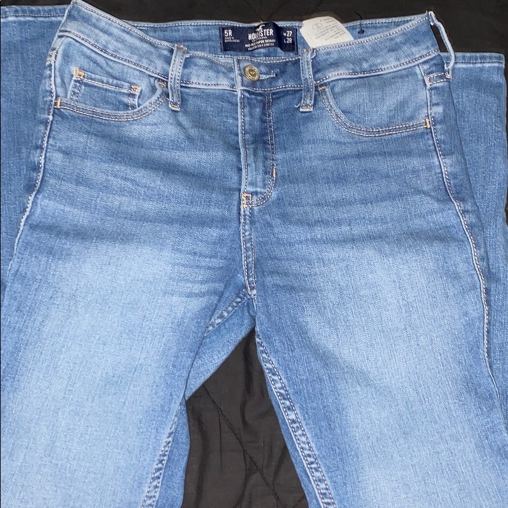 Light washed mid rise super skinny jeans
